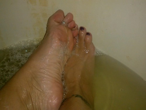 Wife washing her lovely feet