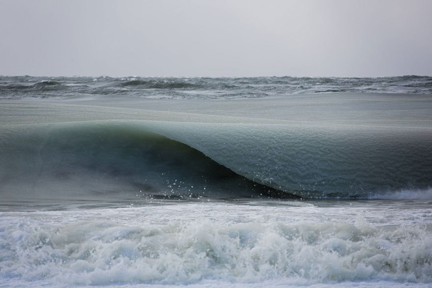 sixpenceee:Freezing Ocean Waves In Nantucket Are Rolling In As Slush  It’s so