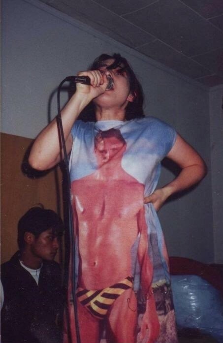 riotgirlstylenow:Kathleen Hanna on-stage looks from the 90s