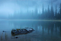 sixpenceee:    “Absolutely one of the most eerie yet beautiful shots I’ve seen to start the morning”  Mary Lake, Yoho National Park, BC, Canada. Photo by Peter Essick.  