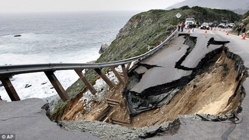 sixpenceee:On March 17, 2011, a large portion of the southbound lane near Rocky Creek Bridge in Monterey County, California broke away, leaving a large hole in the road. Fortunately, no one was injured because of the landslide. (Source)