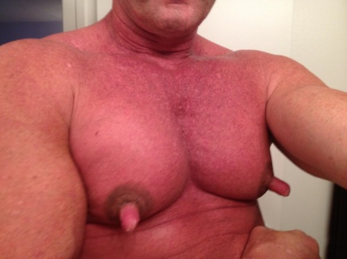 He is one very handsome man and with exceptional pecs and awesome nips!  WOOF