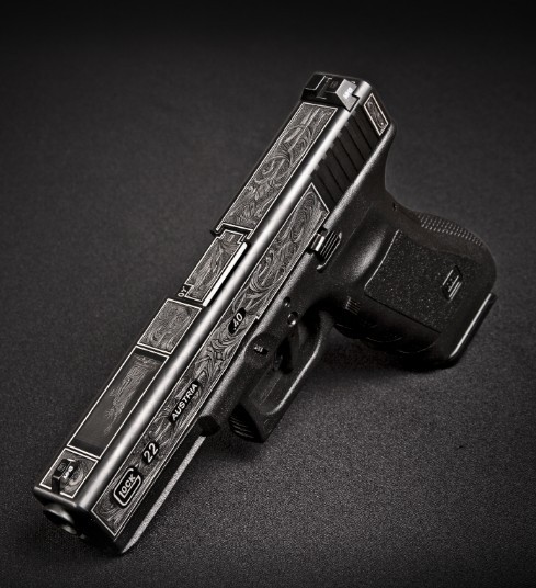 gunsknivesgear:  Looks like the kind of Glock a modern Templar would wield. 
