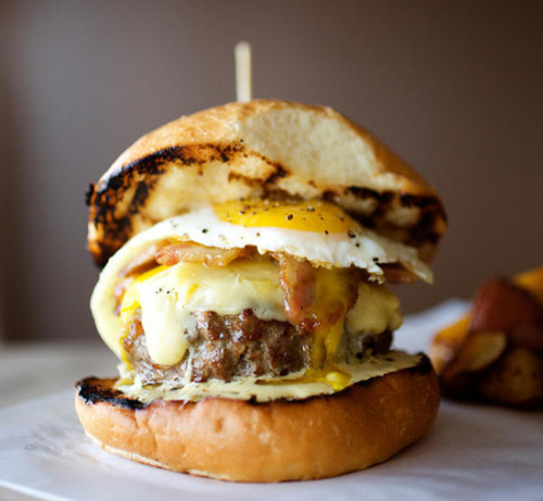 burgerlords:  The Cheeseburger, is Missouri grass fed beef, roasted garlic aioli, bacon, Iowa sharp cheddar and a fried egg served with roasted red potatoes.   Cranes -creativity reigns