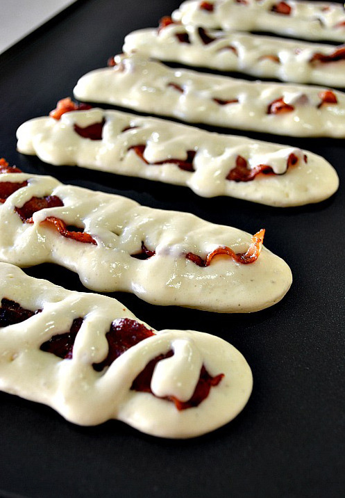 imgonnamakeachange:  luxelashes:  rosaerie:  thecakebar:  Hidden Bacon Pancake Dippers {click link for full tutorial/recipe}  omfg  omg I showed this to my mom and shes actually going to make it for me tomorrow. Praise Jesus.  SWEET JESUS