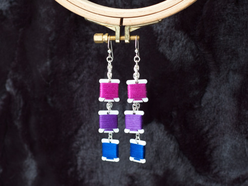 pink / purple / blue embroidery bobbin charm dangle earrings inspired by the bi pride flag [x]