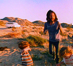 jim-morrison-lizardies-deactiva:  Jim Morrison dancing with kids in HWY: An American Pastoral, 1969.