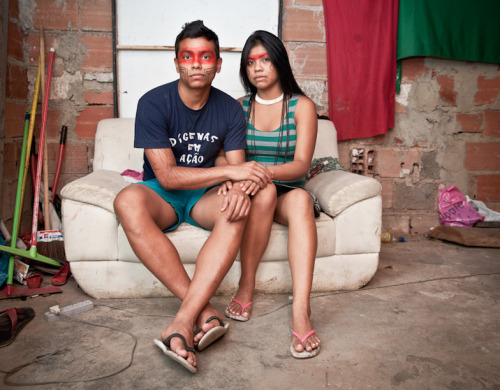 occupiedmuslim:  From the series Aldeia Maracana : Indiians VS FIFA by Kim Badaw RIO DE JANEIRO, BRAZIL - FEBRUARY 2 : Thiago Pater Kayapo and Samantha Aweti Kalapalo the day before they are wed at Aldeia Maracanã on February 2, 2013 in Rio de Janeiro,