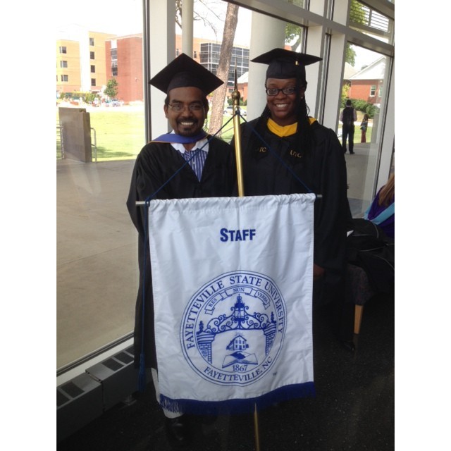 #FlashbackFriday: Mr. Velappan Velappan (#ChesnuttCirculation) and Ms. Carlitta Moore – Staff Marshals at #FallConvocation on September 4th, 2014. #FBF #ChesnuttLibrary #FayState #FSUBroncos #BroncoPride #FayState18 (9.26.2014) (at Charles W....