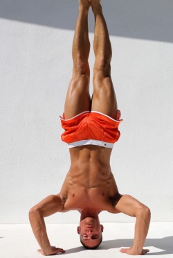 sexy-lads:  Man in classic dolphin shorts doing handstand 