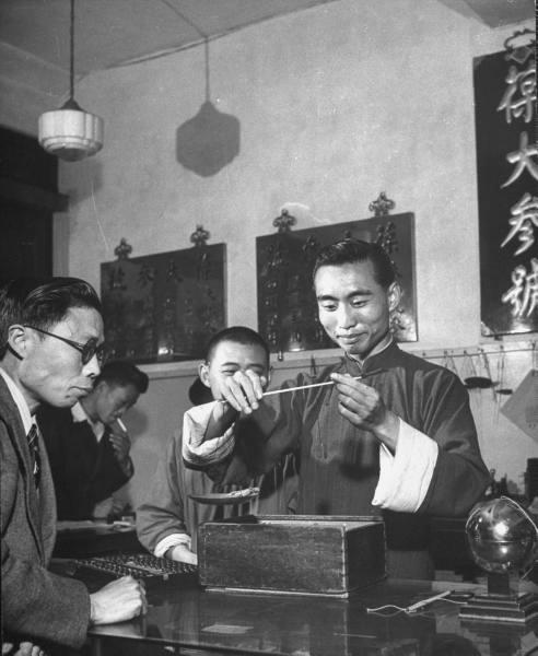 George Silk: Shanghai Pharmacies, 1946 1. Dry lizard and rattle snake powder used for medical c