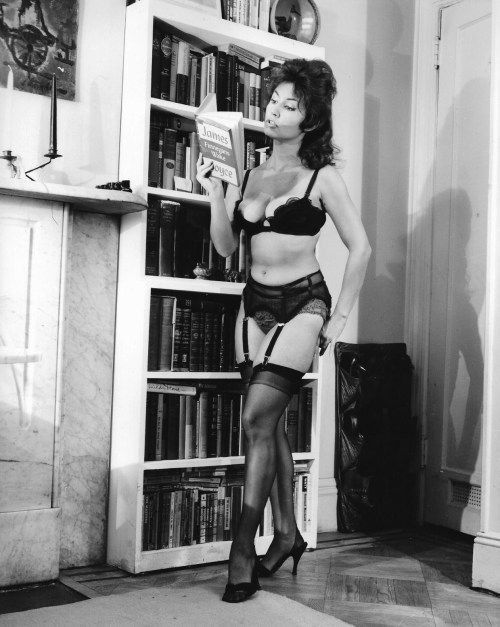 olgas-house-of-shame: The erudite Alice Denham Reading Joyce in lingerie, as most do.