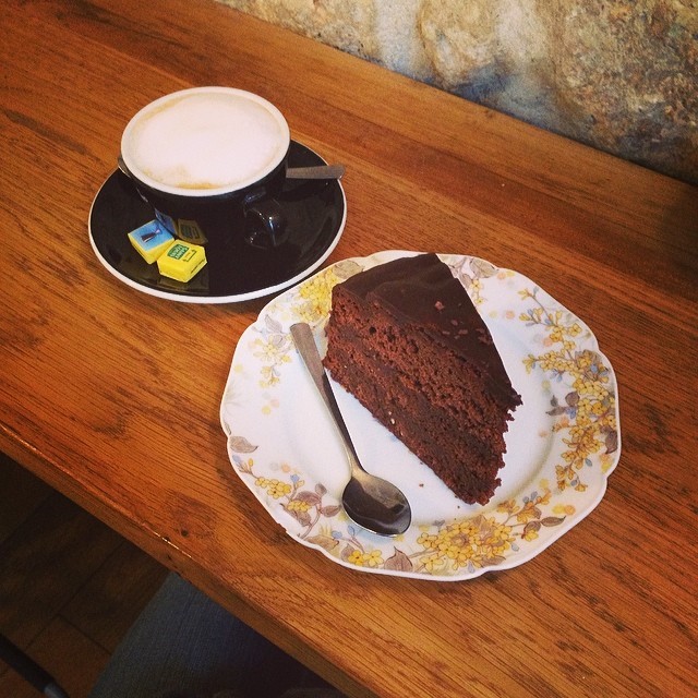 birthday breakfast: cafe creme and devils cake 💝 (at Helmut Newcake)