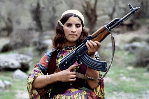 Kurdish girl guarding her family’s mountain hide-out in Northern Iraq, 1979 by eaglemaxie