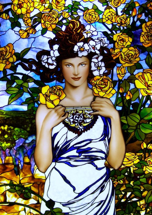 naturalbuildingencyclopedia:  https://www.flickr.com/photos/painterglass/albums/72157624456028100   “Figure painted by Jim Berberich , stained glass created by Bogenrief Studios. All beads and book detail hand painted .” Alphonse Mucha is the inspiration