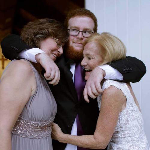 My parents just got married, and I thought I should share a picture. (I’m the guy in the middl