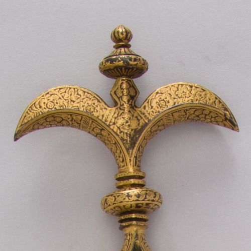 art-of-swords:Chilanum Dagger with SheathDated: 18th centuryCulture: IndianMedium: Iron, gold, leatherMeasurements: H. with sheath 16 3/8 in. (41.6 cm); H. without sheath 15 1/4 in. (38.7 cm); H. of blade 10 13/16 in. (27.5 cm); W. 3 9/16 in. (9 cm);