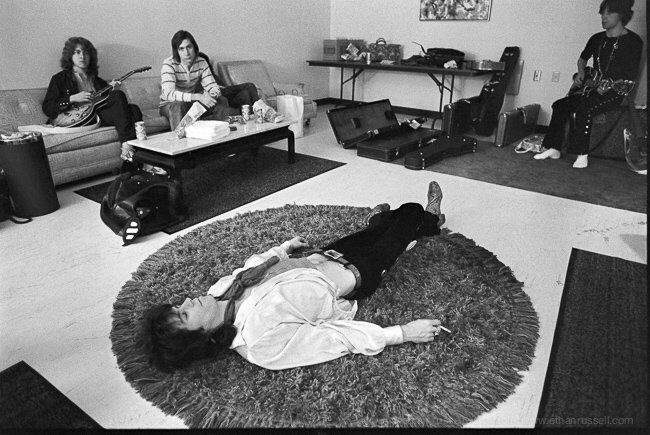 rolloroberson:  Keith Richards on the rug backstage in 1969 L.A. Photo by Ethan Russell.