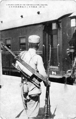 Chinese railway guard at station, 1920′s.