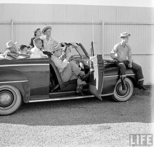 Listening to the Austin Symphony Orchestra perform a drive-in pops concert(Joe Scherschel. 1949)