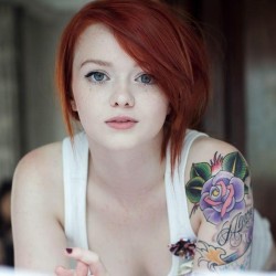 arabelanellen:  Inked blue eyed redhead.