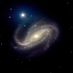 just–space:  The barred spiral galaxy NGC