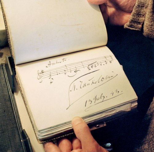 dvorets:  An entry by Peter Ilyich Tchaikovsky on a page of a guest book at Houghton Hall, photographed by Jonathan Becker for Vanity Fair. 