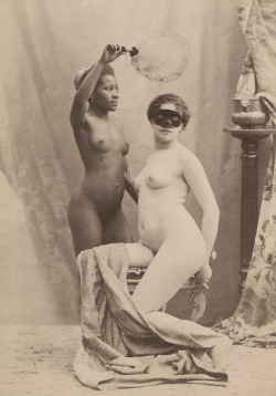 Les-Sources-Du-Nil:  Naked Masked Woman And Her Black Servant.â Anonymous, Circa
