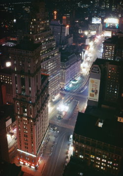 fuckyeahvintage-retro:  Times Square and Garment District at night, 1945 © Corbis/Magnolia Box 