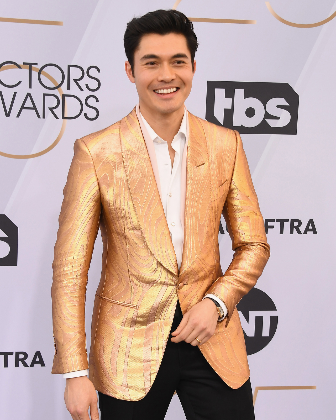 TOM FORD - Henry Golding wore a gold TOM FORD Atticus...