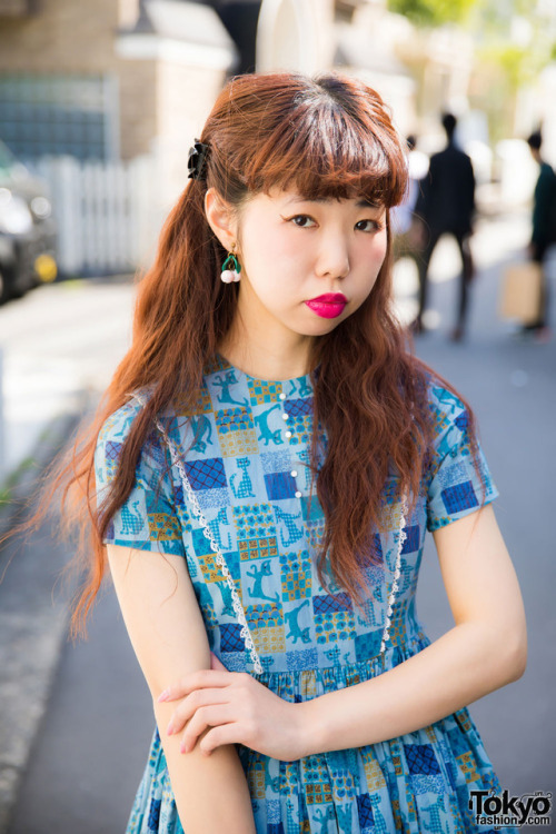 tokyo-fashion: Mio from the popular Harajuku vintage boutique G2? on the street in Harajuku wearing a 1950s cat print dress with wedges and vintage accessories. Full Look