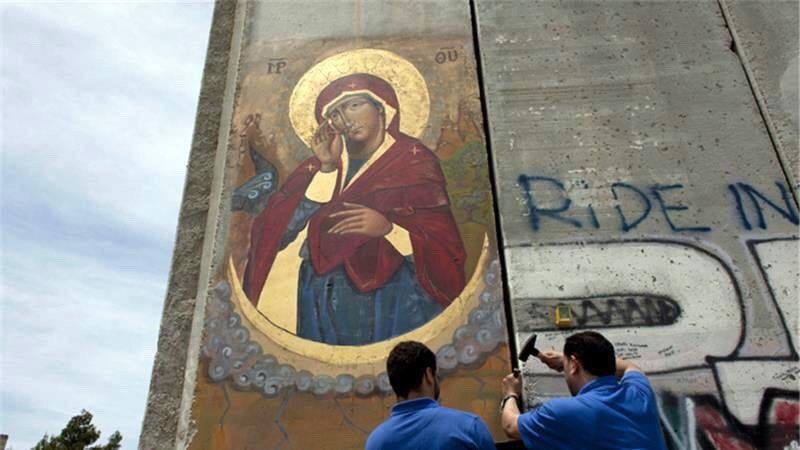 affiler:  How about art by actual Palestinians?  Located on the Apartheid Wall in