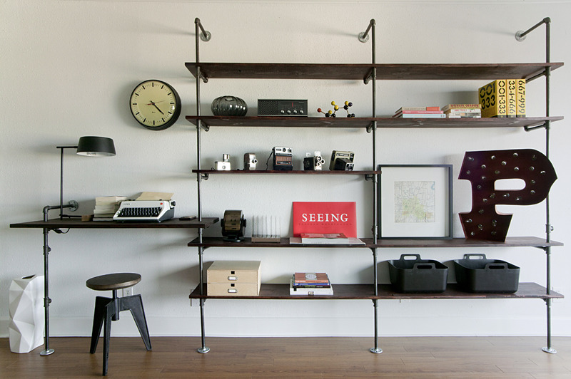 Mid-century modern desk integrated with a wall unit.