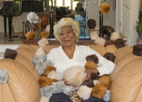 glamourcat28:In case you were having a bad day, here’s a photo of Nichelle Nichols covered in tribbl