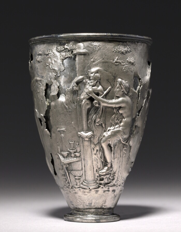 via-appia:  The Vicarello Goblet: woman at the shrine of the god Priapus, maenad