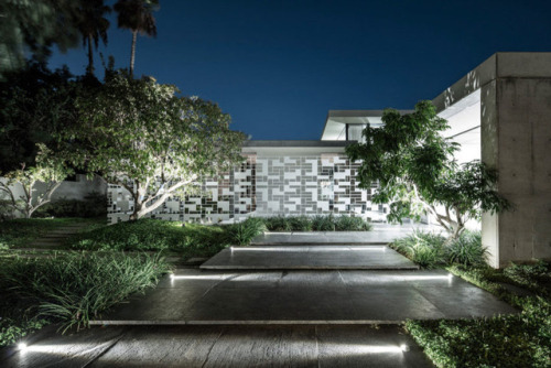 AB House by Pitsou KedemScreens with a perforated geometric pattern help to control the flow of ligh