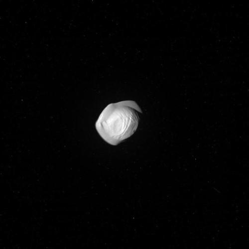 explorationimages: Cassini: Saturn’s tiny moon Pan, March 7th 2017. Pan orbits in the Encke Ga