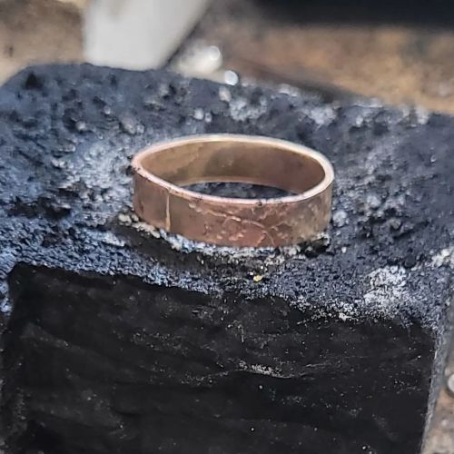A yellow gold oak ring soldered and ready for cleaning up just a little bit before going to the assa