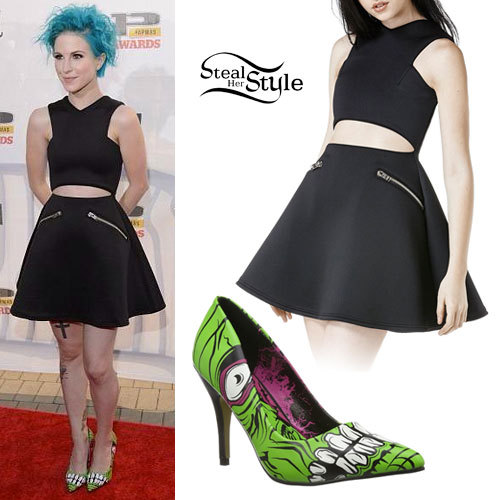 Hayley arrived on the red carpet at the Alternative Press Music Awards in Cleveland last night wearing a UNIF Loft Dress ($145.00) with cutouts and zippers and a pair of lime green Iron Fist Women’s Zombie Stomper Pumps ($45.00).