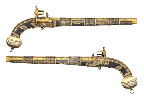 Gold and silver decorated miquelet pistols from the Caucasus, dated 1856from Thomas Delmar Ltd.