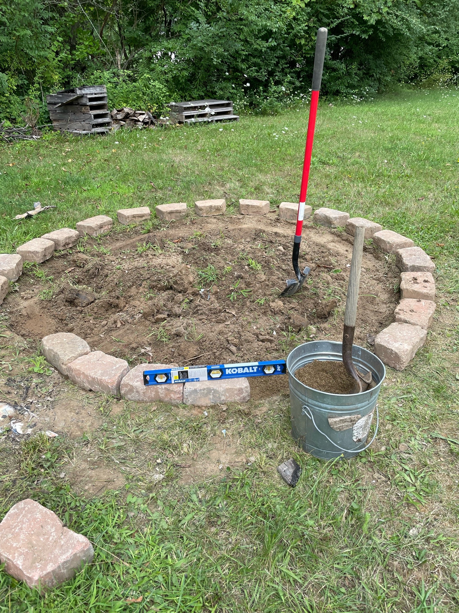 Worked on the fire pit today, mostly level except for the end( used the level the whole circle anddd it’s not level to the beginning of the circle🙄🤦🏼‍♂️) then mowed the lawn. Was a good productive day🤘🏼