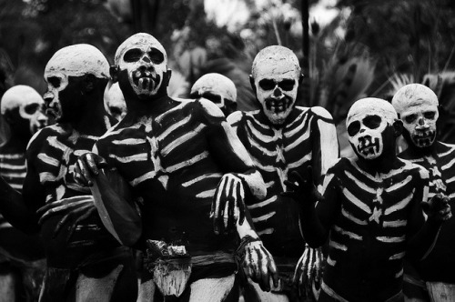 The Chimbu Tribe of Papua New Guinea (top)The Asaro Mudmen of Papua New Guinea (bottom)