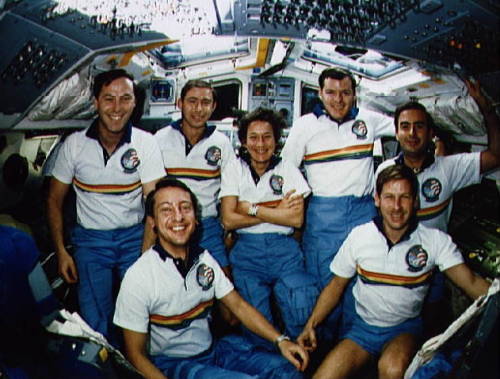 Crew of STS-61-B on the aft flight deck of Space Shuttle Atlantis