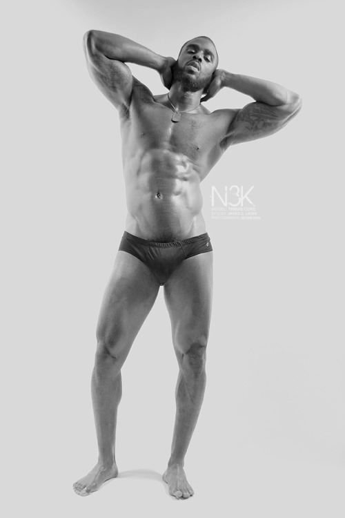 black-mens-skin:  Travis Cure Photographer: James C. Lewis  The archive:http://black-mens-skin.tumblr.com/archive  Mmmm