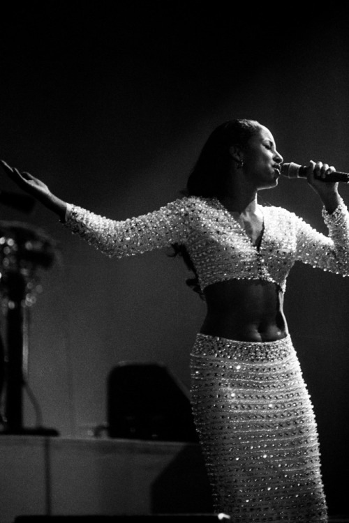 70sbestblackalbums:  ROTTERDAM, NETHERLANDS - 26th APRIL: English singer Sade performs live on stage at Ahoy in Rotterdam, Netherlands on 26th April 1993. (Photo by Paul Bergen/Redferns) 