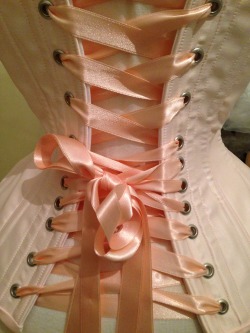 xandrianacorset:  Chiffon is the fabric from hell… I’ve been working on some bridal pieces, so here’s a sneak picture of a blush pink satin overbust corset 