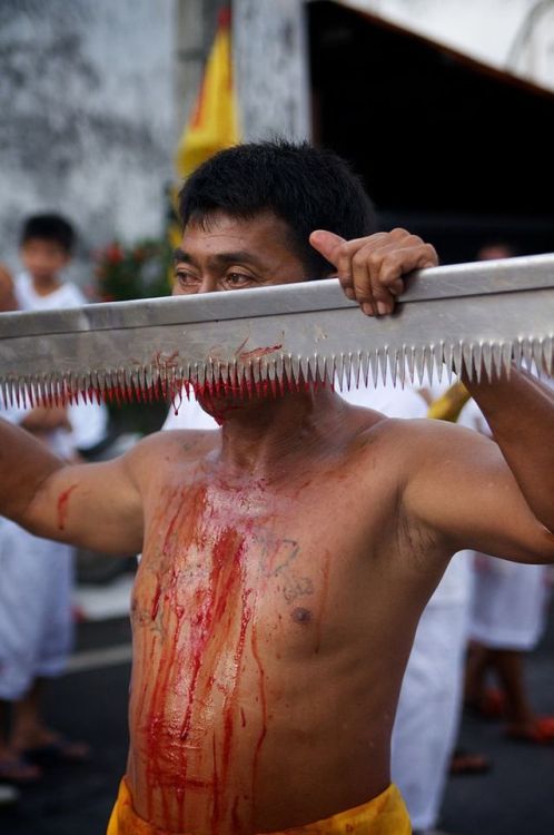 Self-flagellation during the Vegetarian Festival (or Nine Emperor Gods Festival), Phuket, 2011.