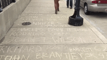 the-real-eye-to-see:  An artist in Baltimore wrote names of fatal victims of the police force along the sidewalk.  She began with victims killed on May 1st of 2013 and wrote every name that was recorded until the present day. Names stretched from Penn