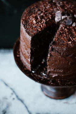 chocolateguru:  Double Dark Chocolate Cake   @kailerathienA messenger knocks at the door to the apothecary shop, then leaves the gold box tied closed with a brown ribbon on the doorstep. The note tucked neatly up under the ribbon in it’s white envelope