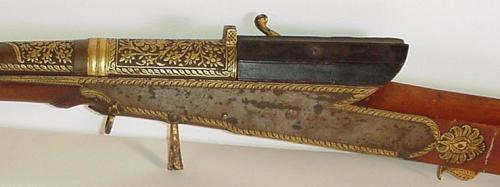 Ornate gold decorated matchlock torador musket originating from India, early 19th century.
